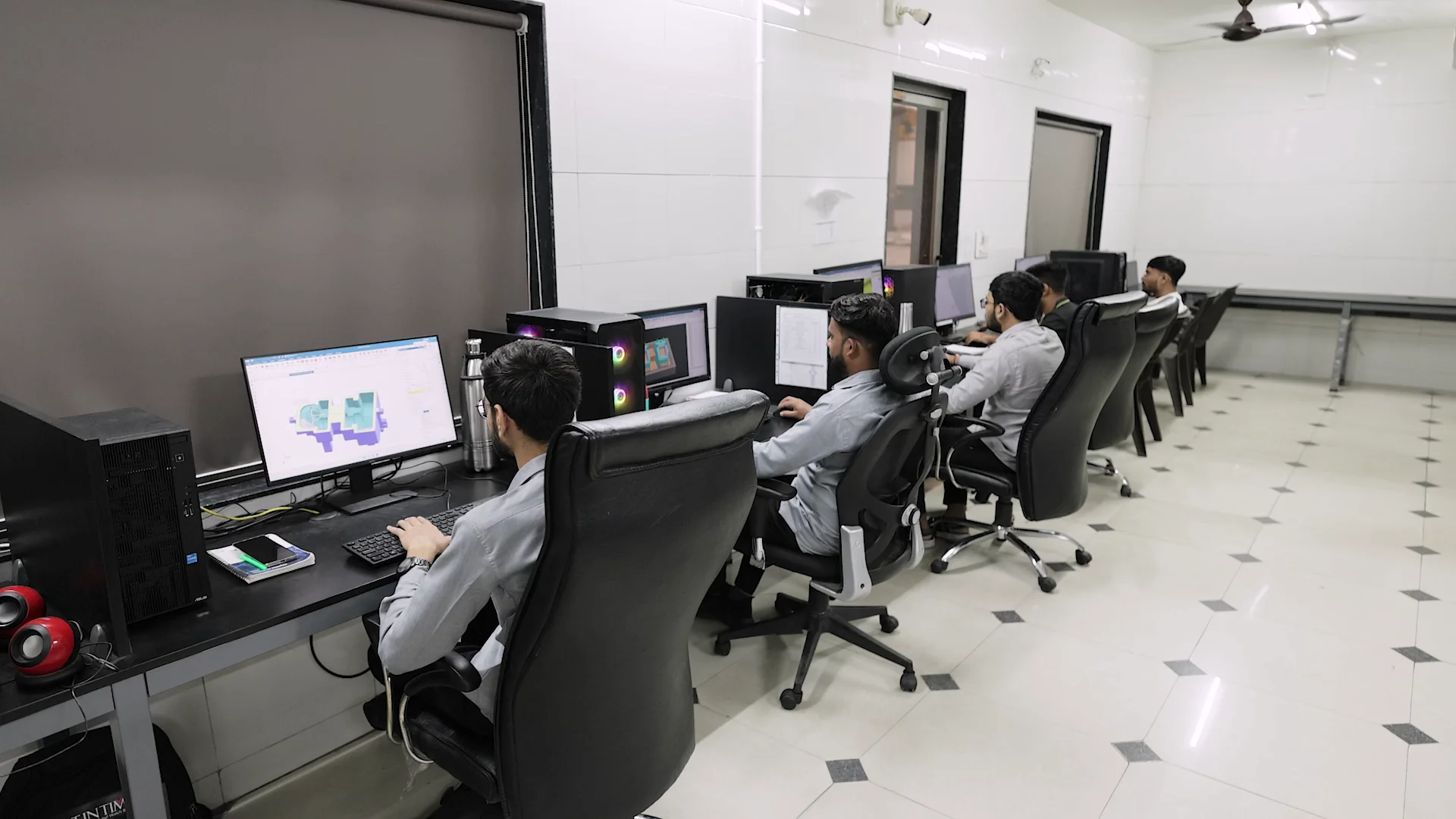 PTPL design engineers working with CAD software